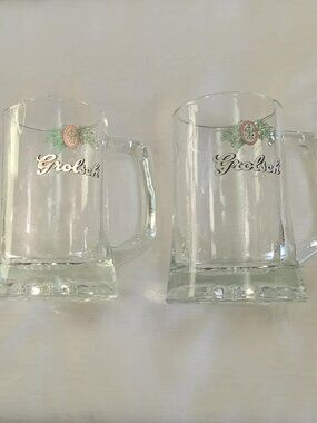 Two vintage Grolsch beer mugs or glasss with the brewery's logo